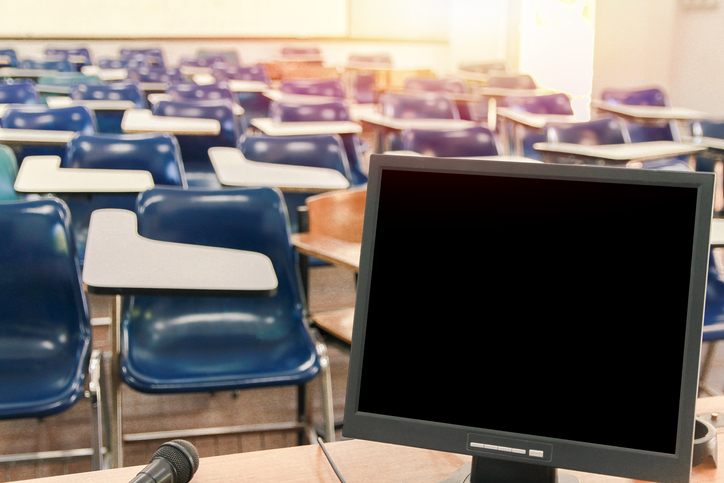 Computer On Table At Classroom