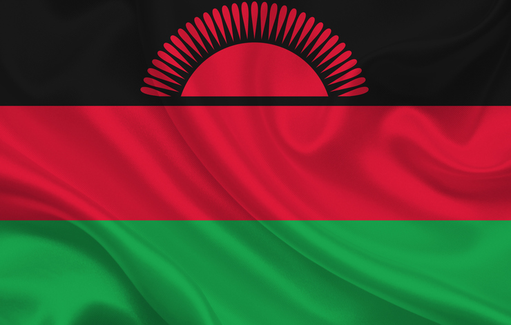 Malawi country flag on wavy silk fabric background panorama
