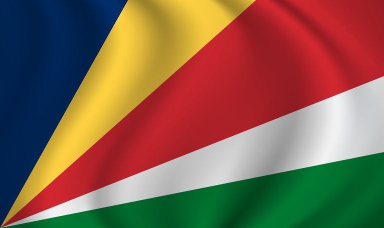 Seychelles waving flag blowing in the wind. Texture can be used as background. Vector illustration EPS10