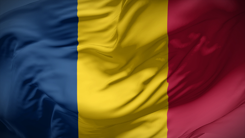 Close-up view of Chad national flag fluttering in the wind.