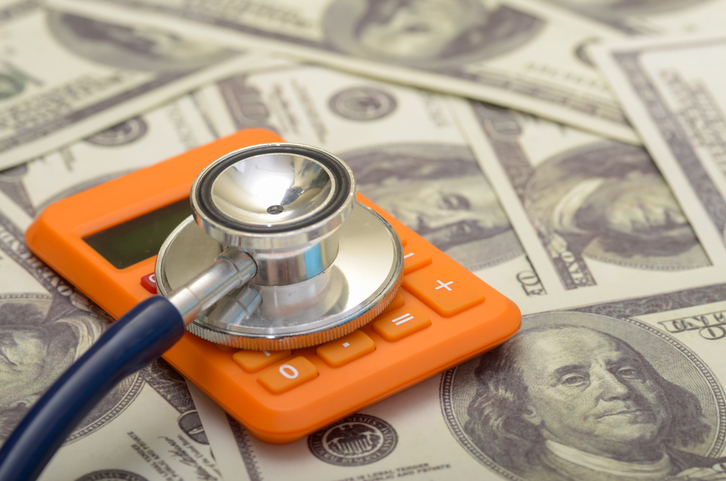 The image highlights the financial burden of medical expenses, emphasizing the need for affordable and accessible healthcare for all.