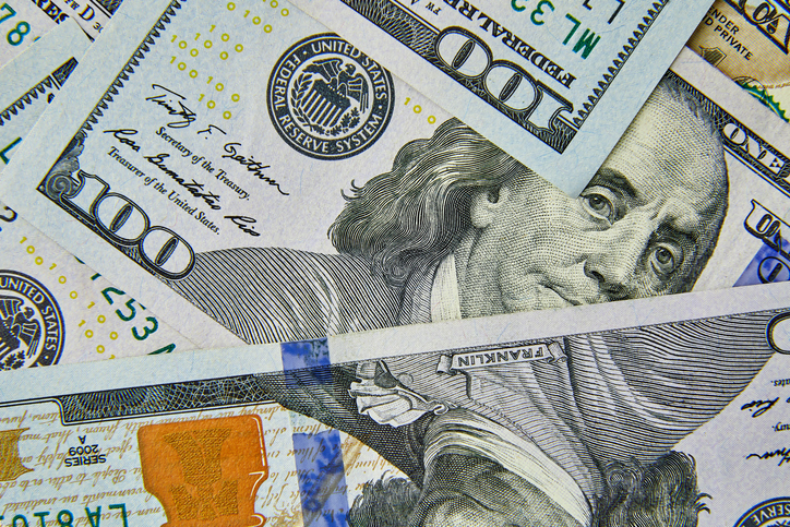 Flat lay Closeup on the bills for a US hundred dollar banknote